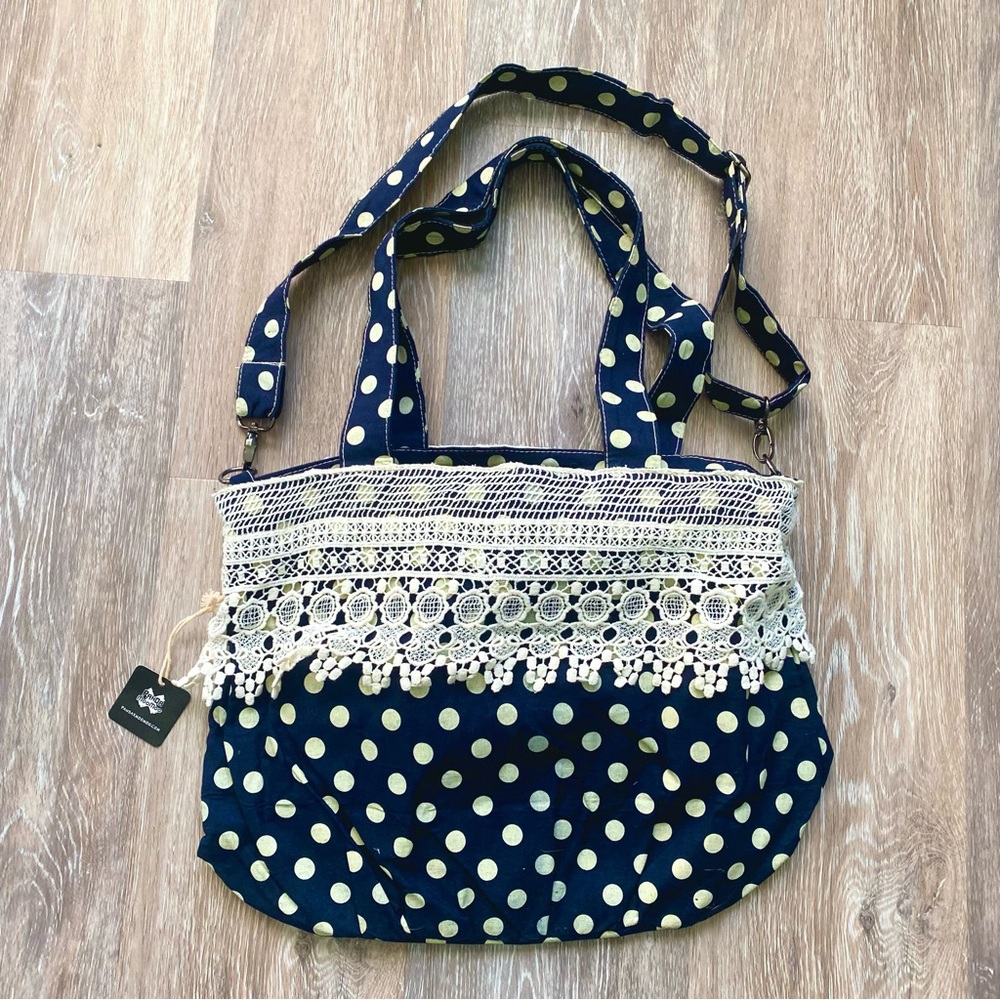 Navy and white polka dot bag